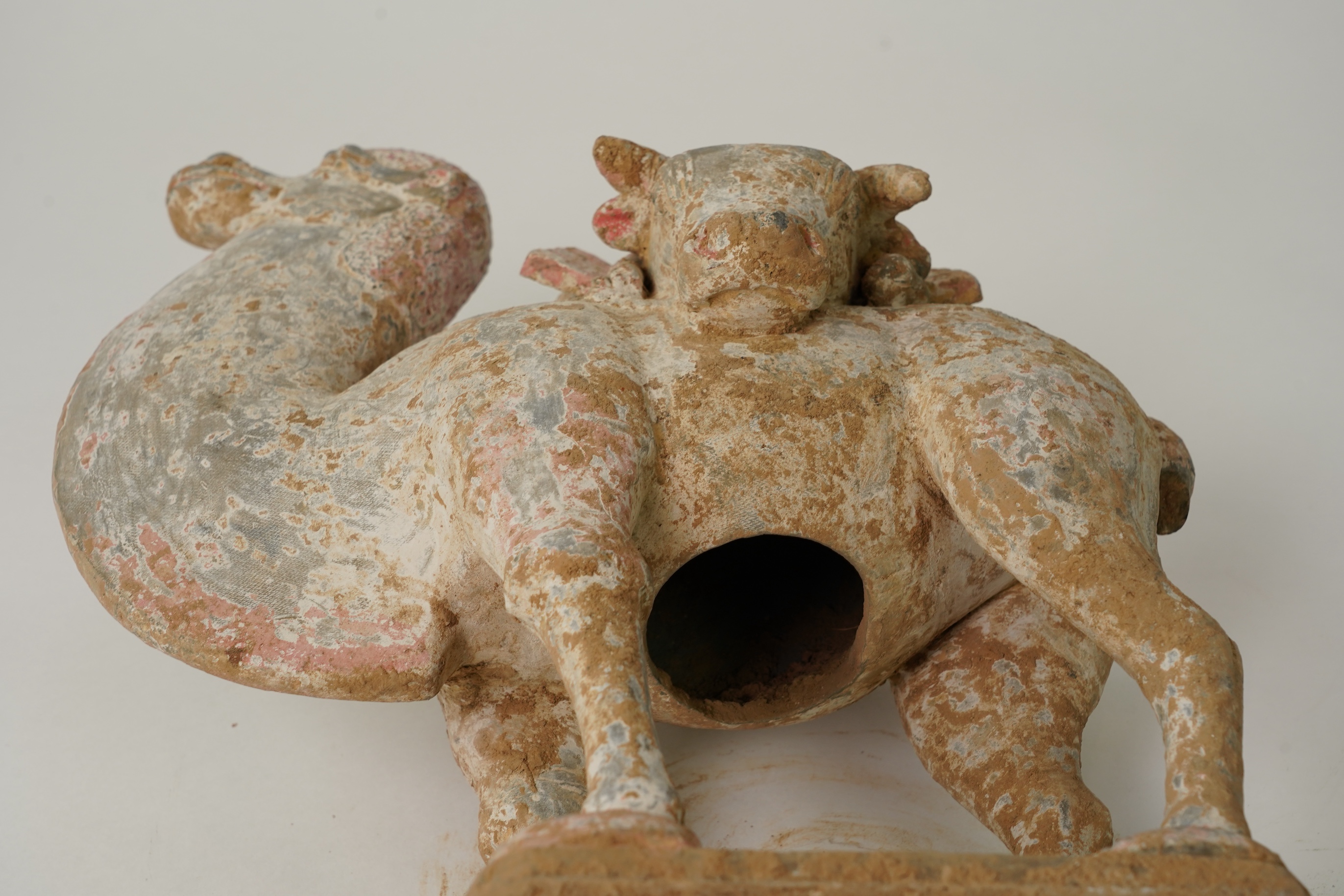 A Chinese pottery tomb figure of a Bactrian camel, Tang dynasty or later
